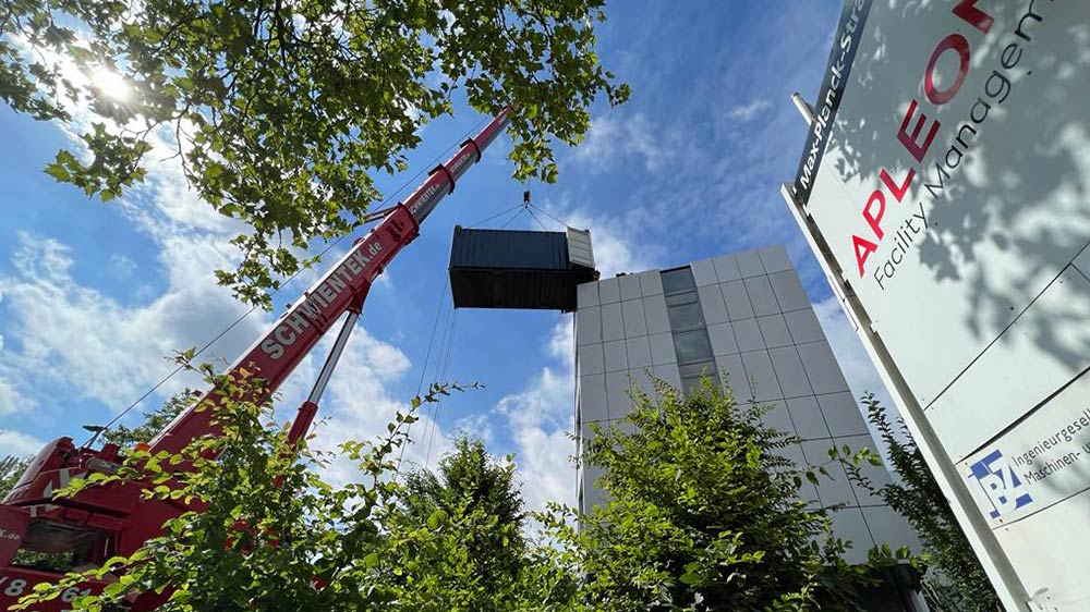 Schneller, besser, höher: Neuer effizienter Spreader für Container beschleunigt Firmenumzug von ER-WE-PA